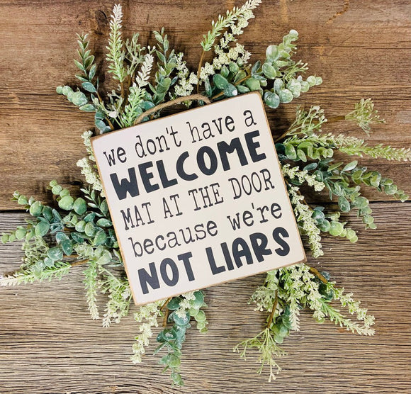 Don't Have Welcome Mat/Not Liars Sign