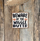Beware Of Wigglebutts Sign