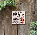 IT'S NOT A PARTY TIL THE WIENER COMES OUT, DOG SIGNS